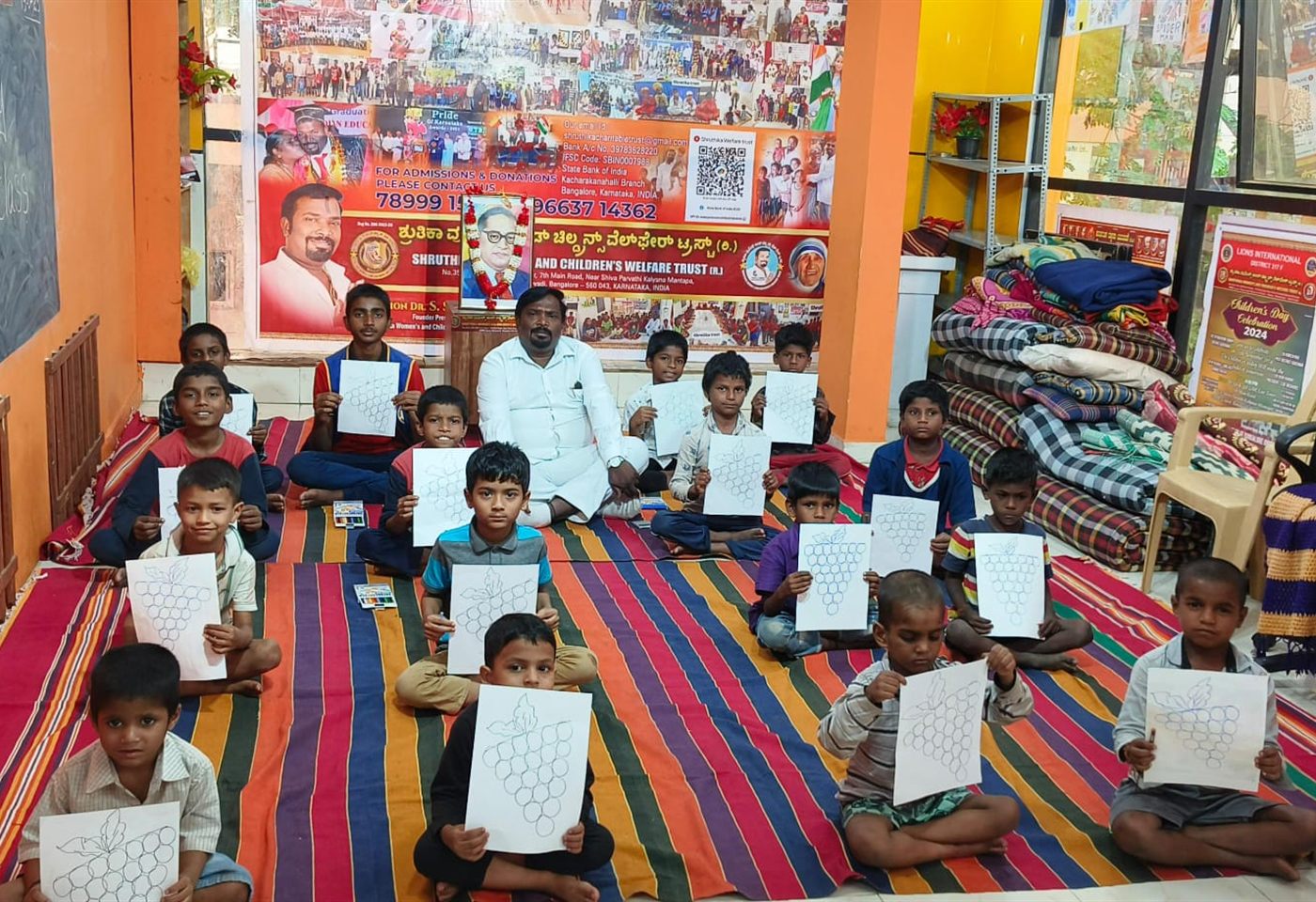 Volunteers and children at a trust event